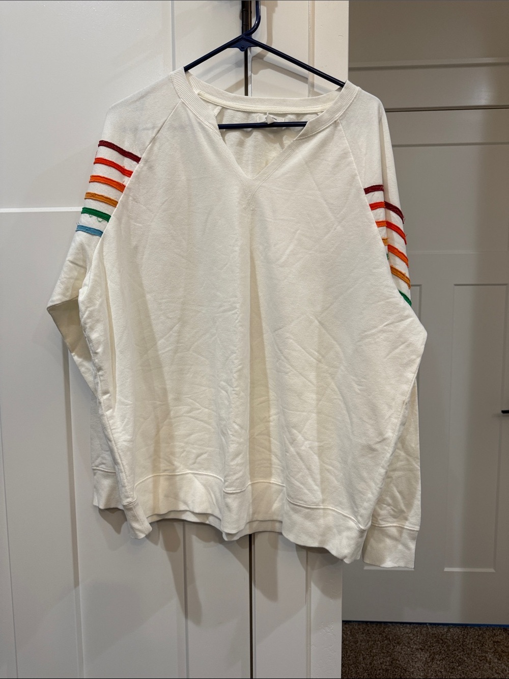 Maurices Cream Crewneck Sweatshirt with Rainbow Sleeve Stripes